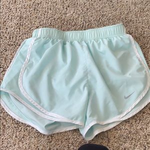 Nike light blue dry fit running shorts